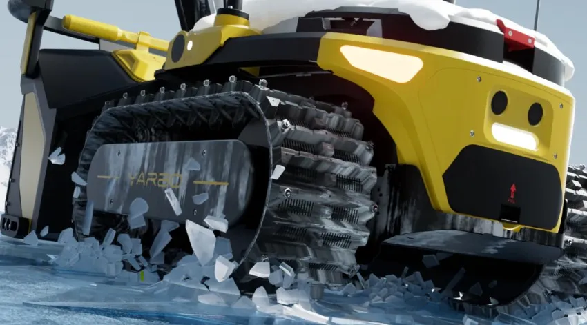 Close-up of the tracked drivetrain with steel traction spikes biting into ice